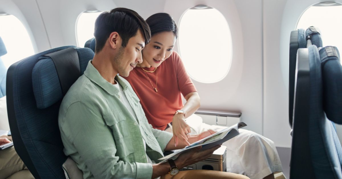 Reizigers in Economy Class bij Cathay Pacific